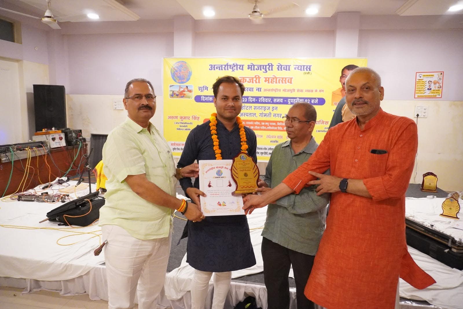 Tejsingh Kushwaha receiving recognition at Kajari Mahotsav